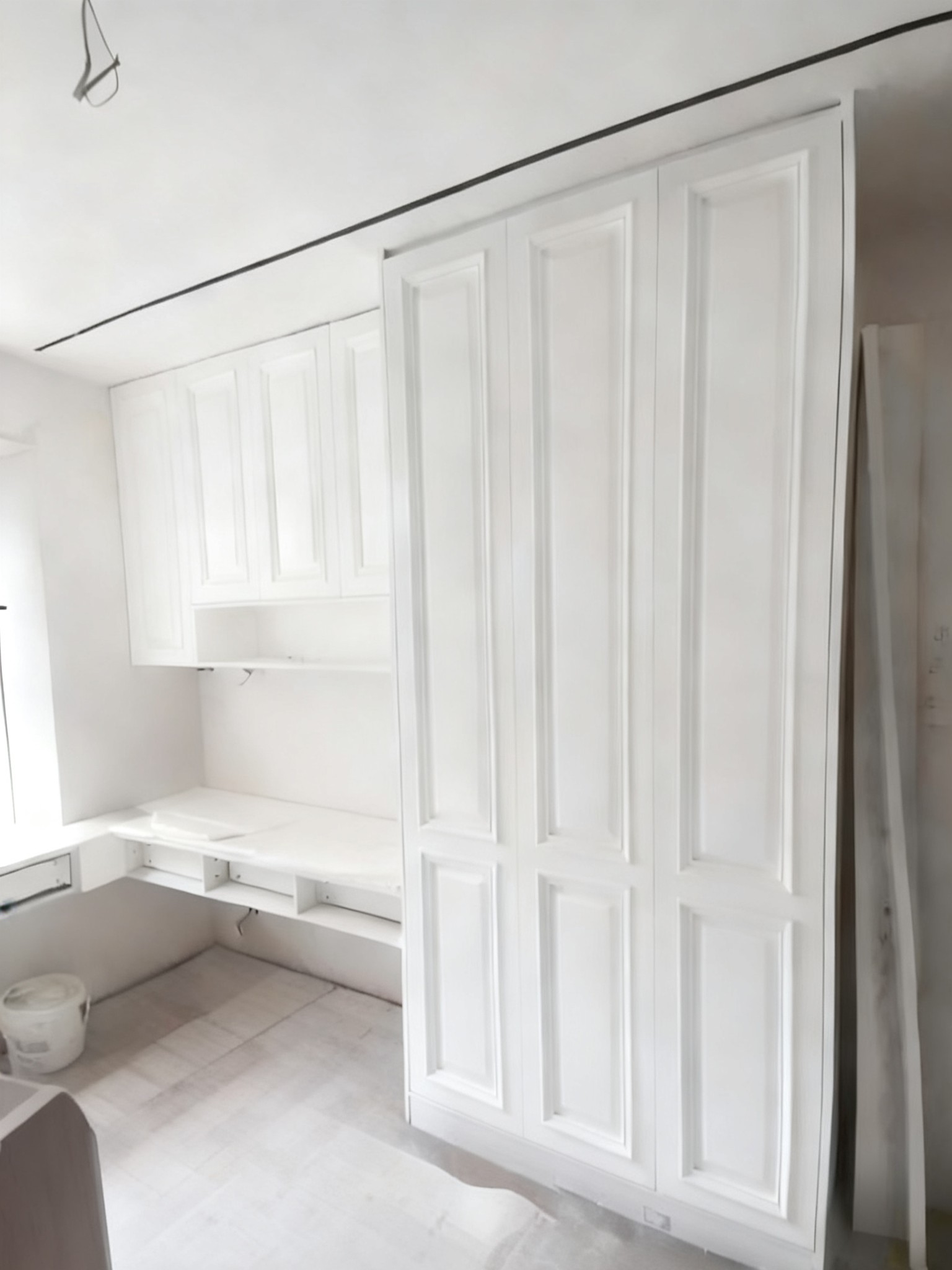 Secondary bedroom: custom wardrobe and writing desk