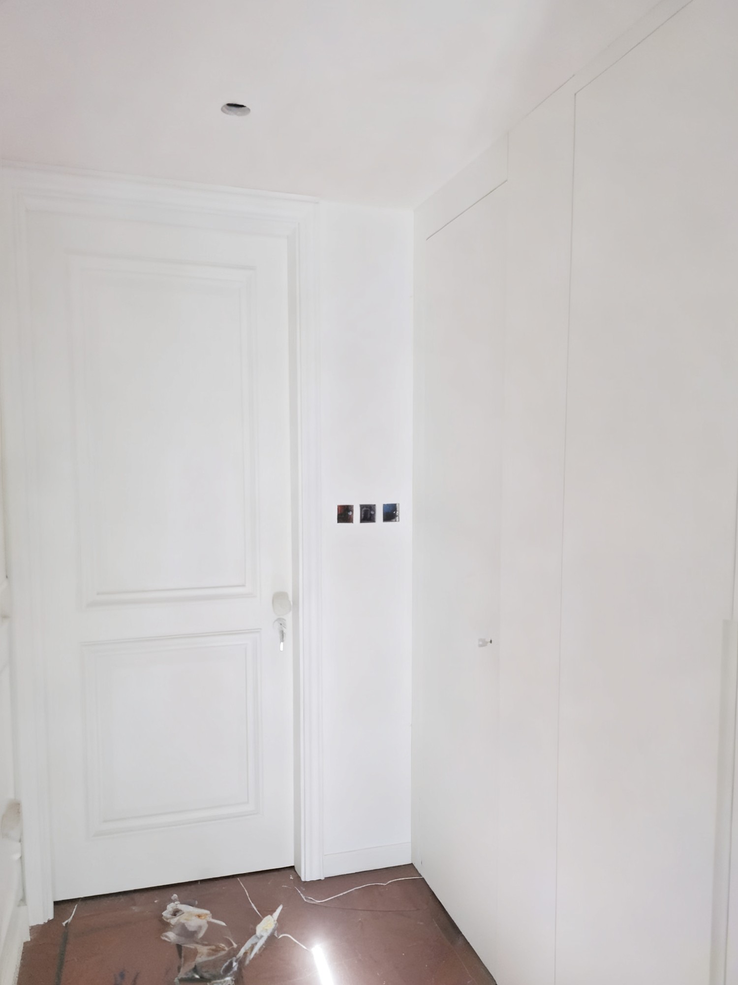 Master bedroom: butterfly-door concealed wardrobe