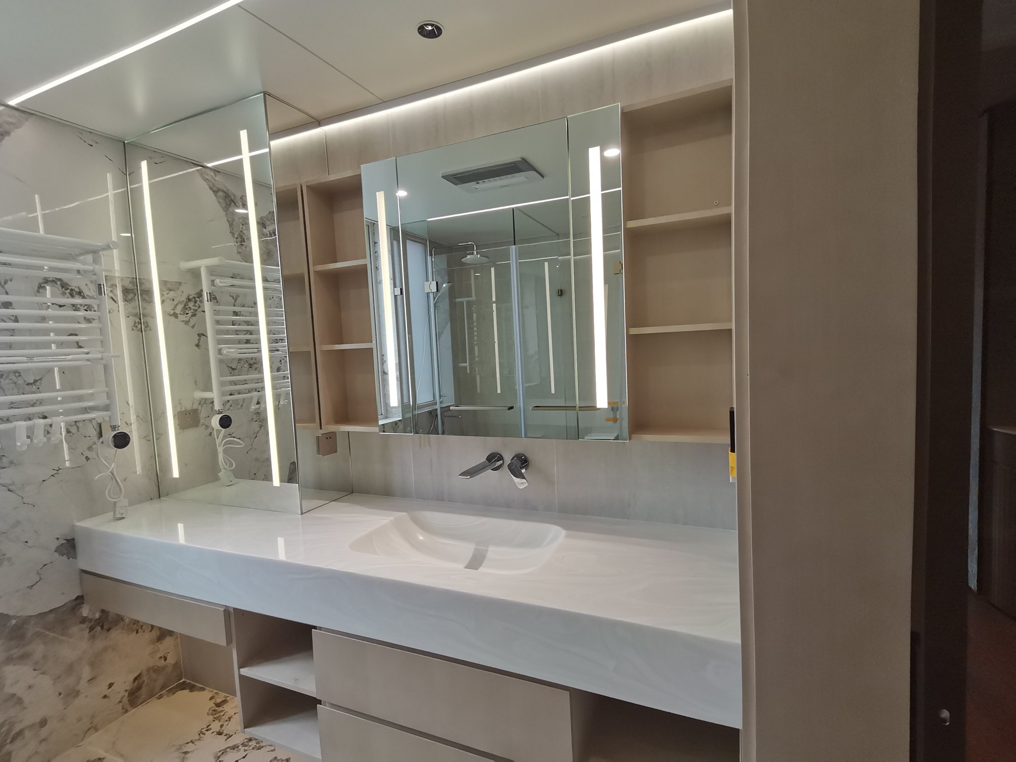 Bathroom custom vanity cabinet with illuminated mirror cabinet and shelving