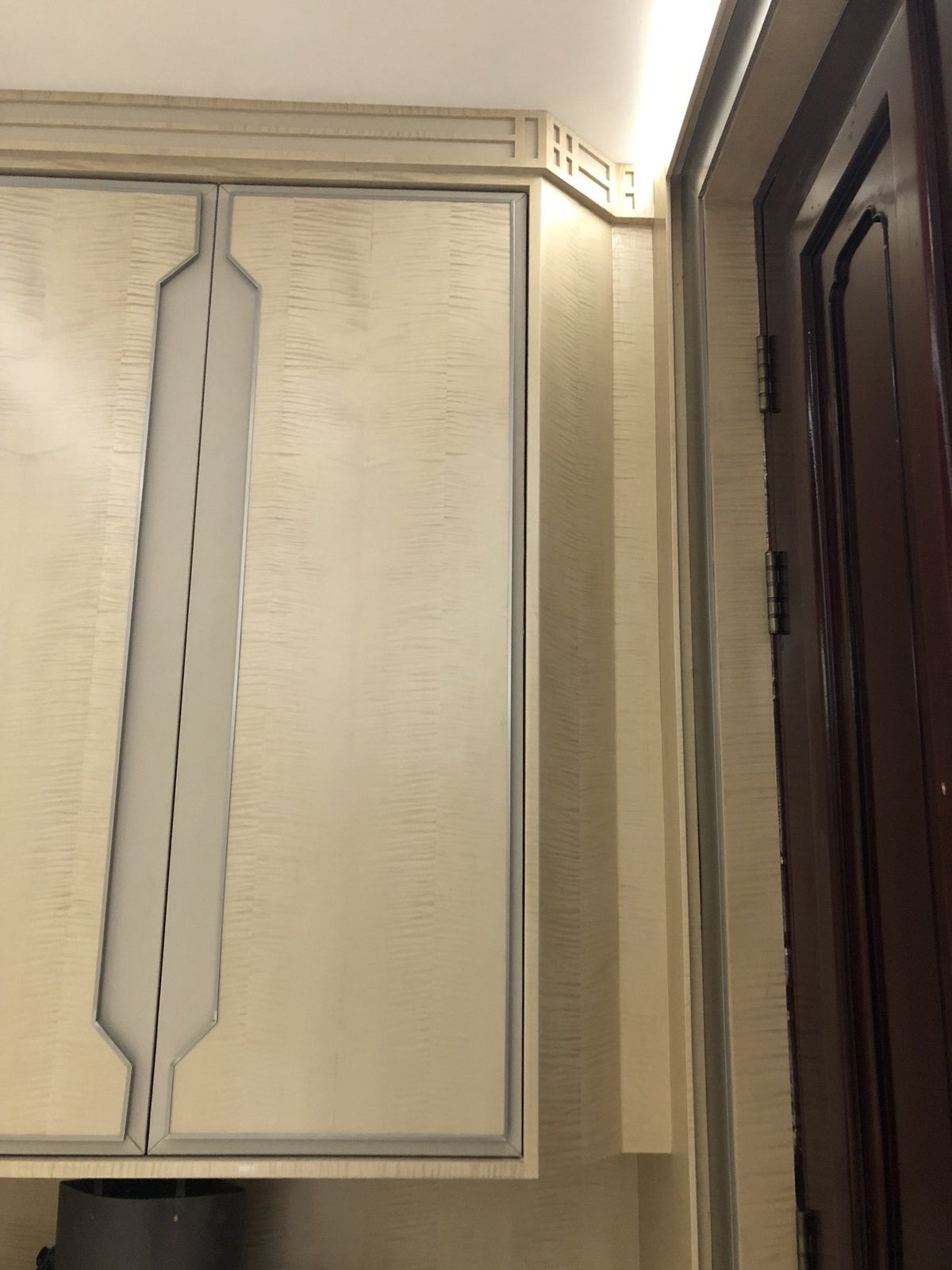 Bedroom custom cabinet with Chinese-style moulding lines.