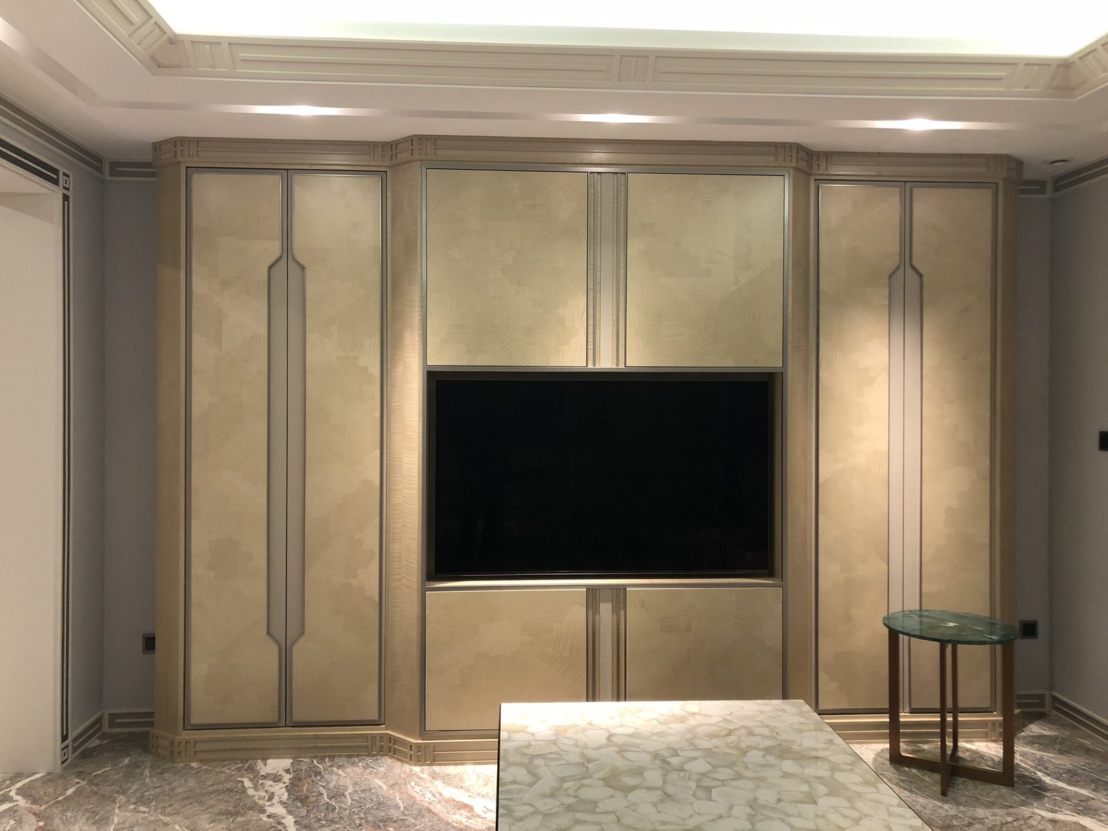 Living room TV wall custom cabinet and wall paneling.