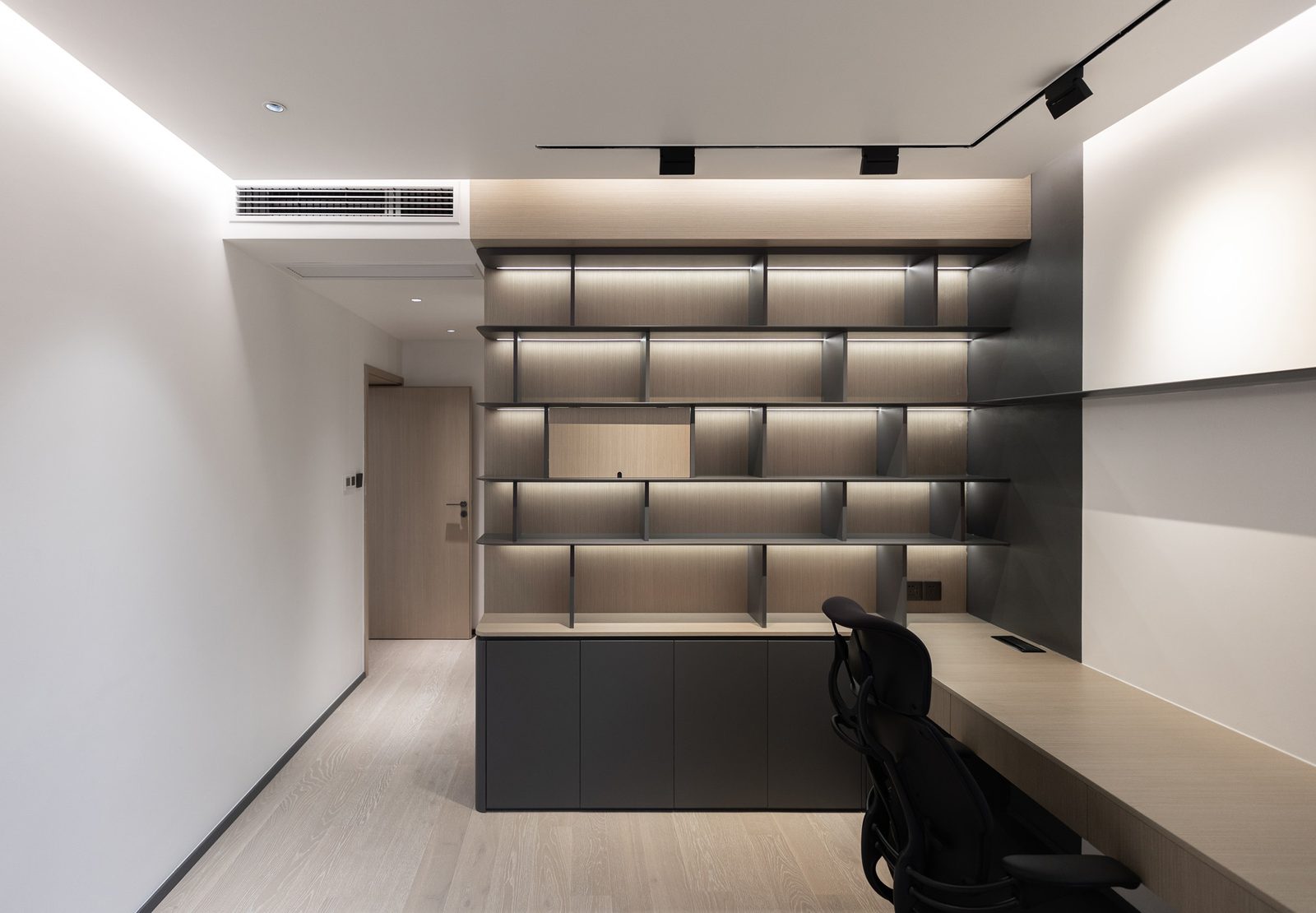 Study bookcase with ambient lighting and desk cabinets