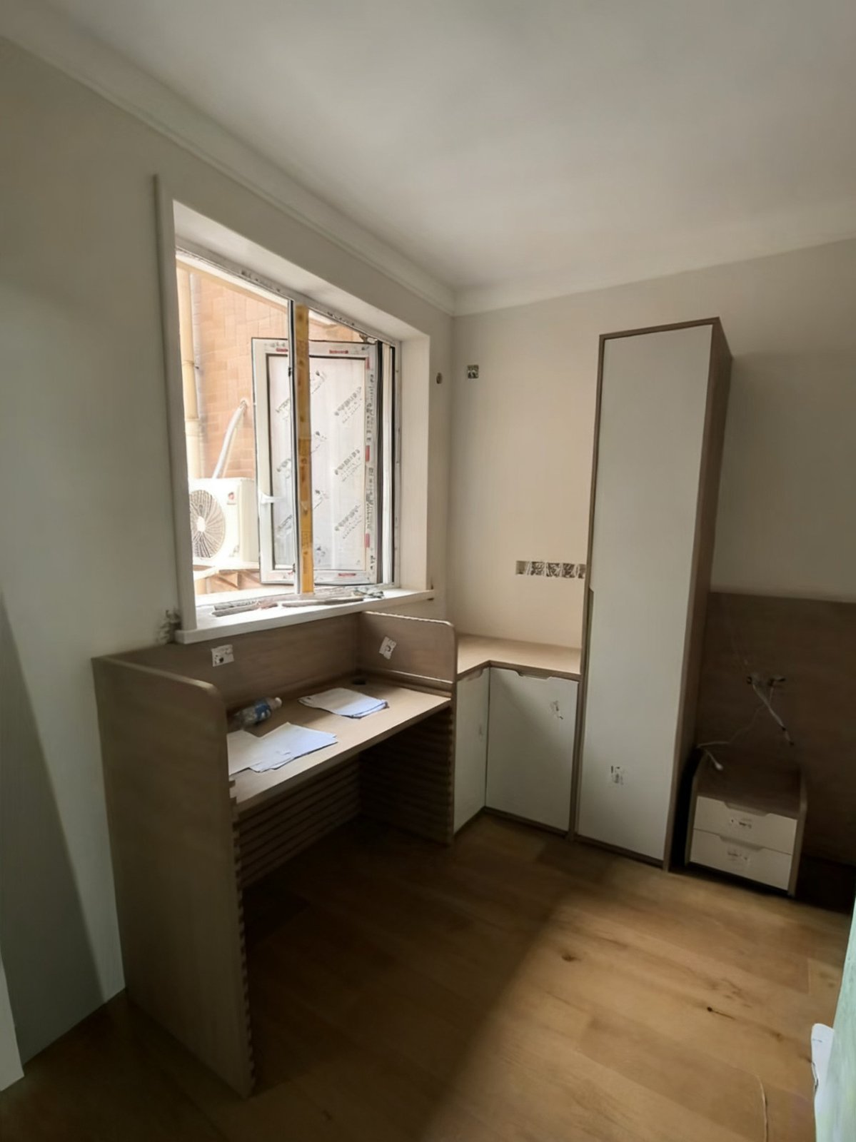 Children's room: custom desk, corner cabinet, and standing wardrobe